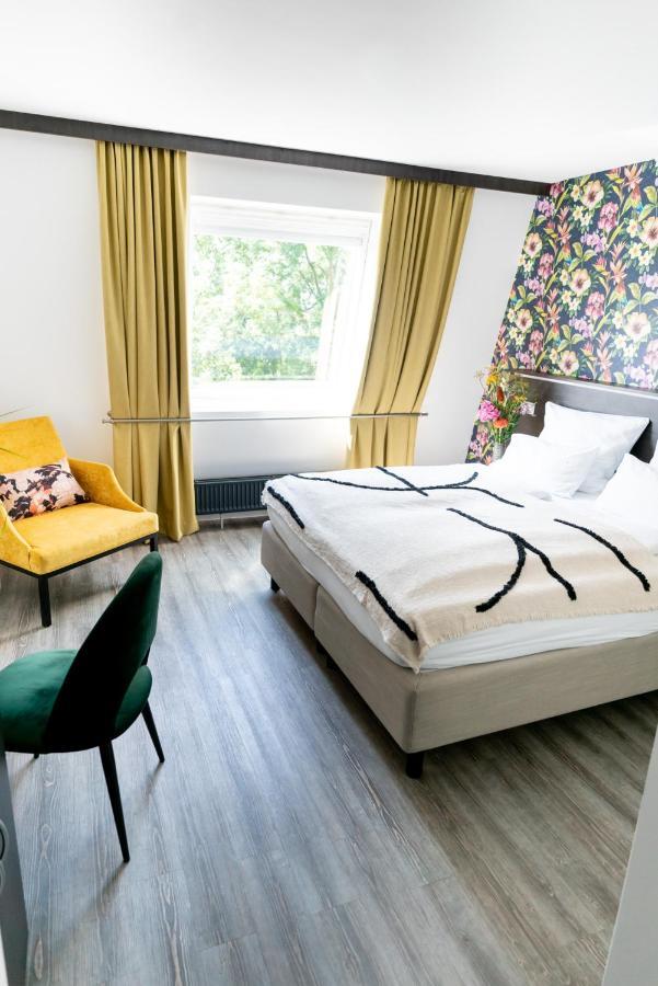Luxstay Karben Buitenkant foto